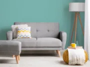 Éliane Convertible Sofa from natural wood legs  & Tufted Backrest.